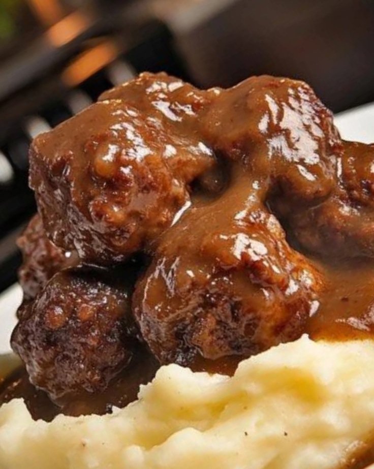 Meatballs with Gravy over Mashed Potatoes